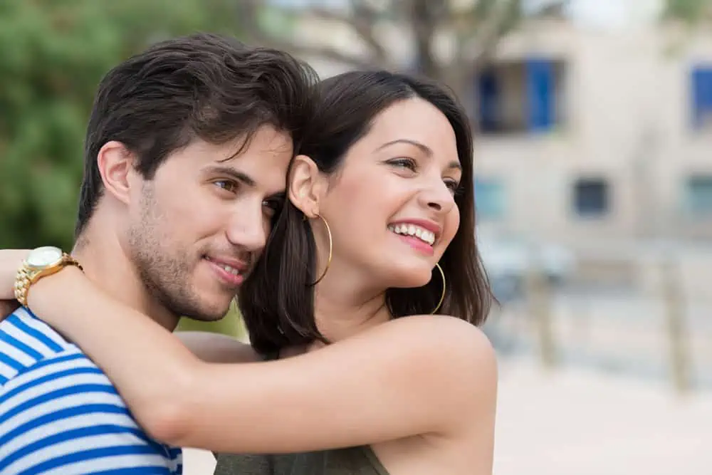 Why Do Girls Hug Guys Around the Neck